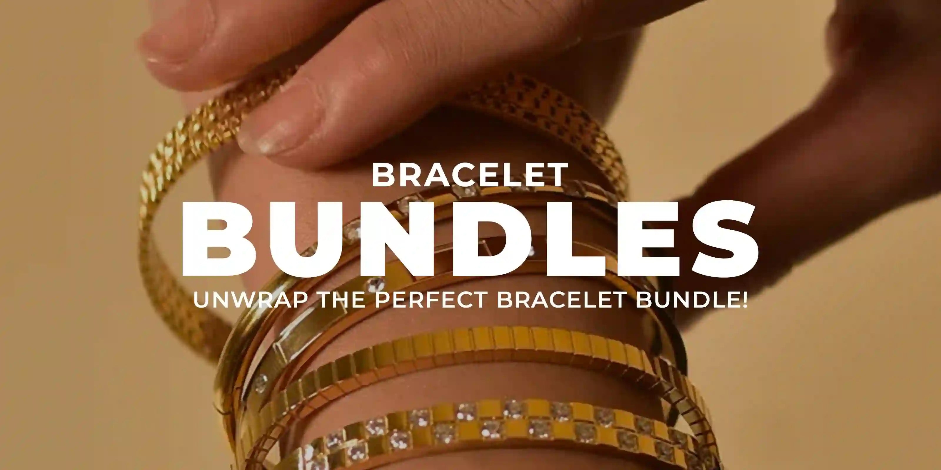 Close-up of hand wearing multiple gold bracelets in a stylish bracelet bundle