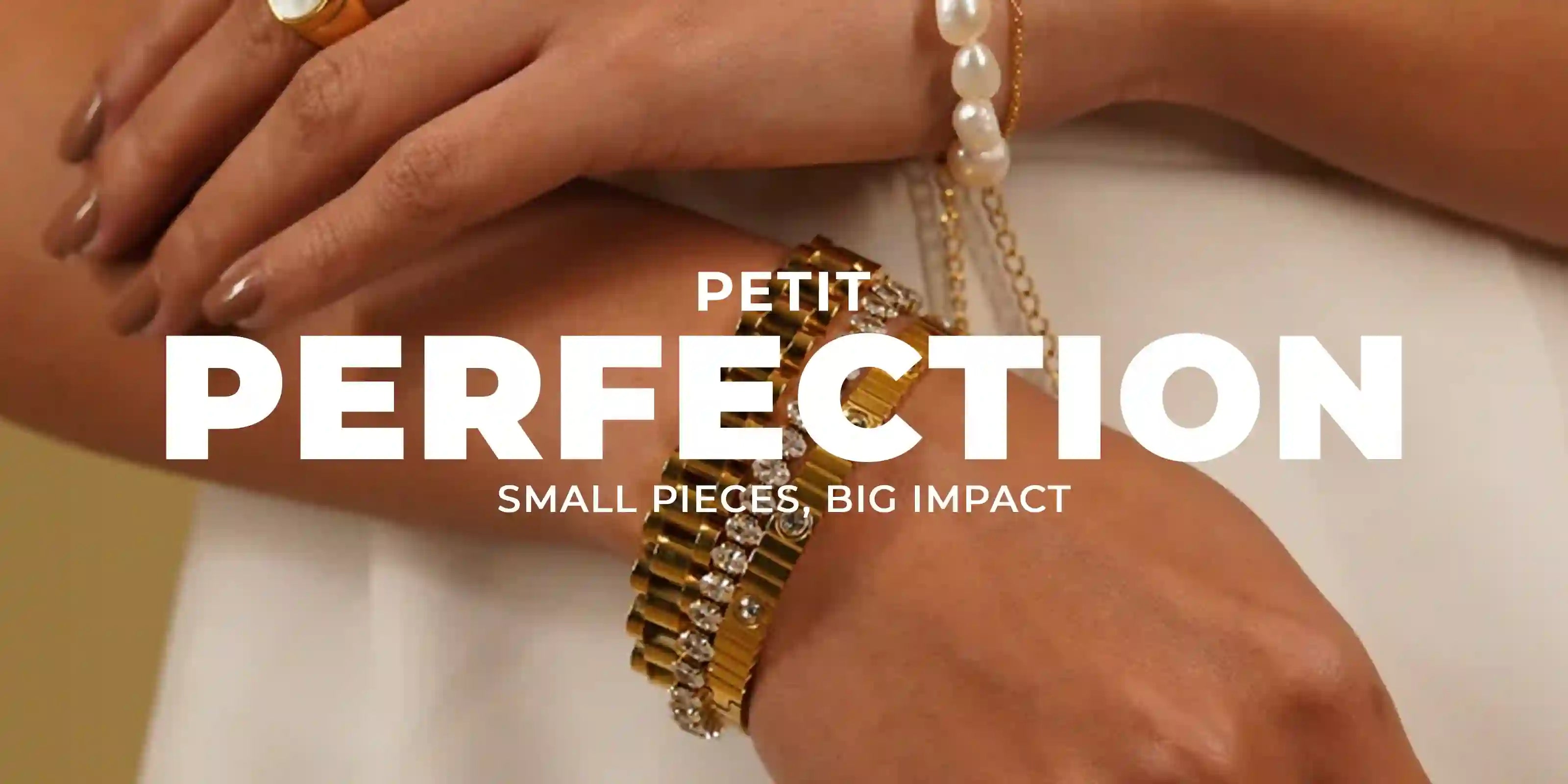 Woman styling in 18k Gold Plated Petit Perfection bracelets with pearl and crystal accents
