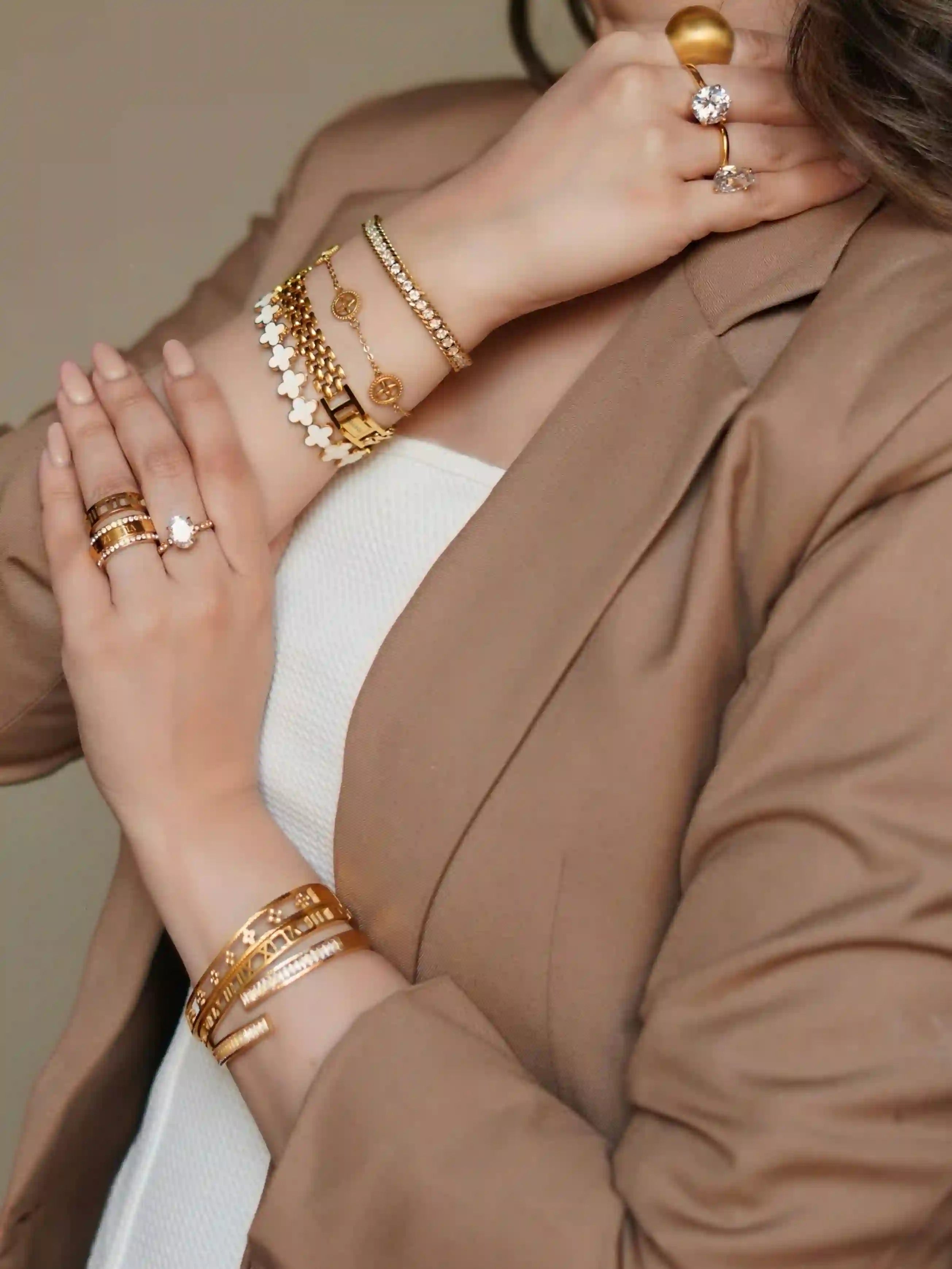 Girl wearing 18k gold plated jewelry. Shop Online at Mithra and Co.