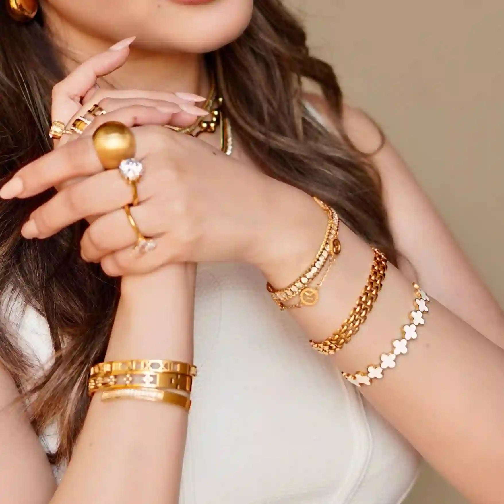 Girl wearing 18k gold plated unique jewellery design. Buy Now at Mithra and Co.