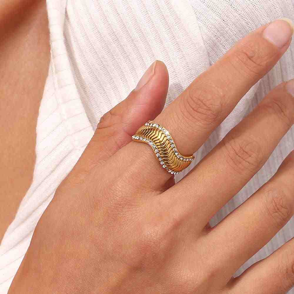 Wearing Wave Ring - 18k Gold Plated Elysian Band. Buy Curved ring with Zircons.