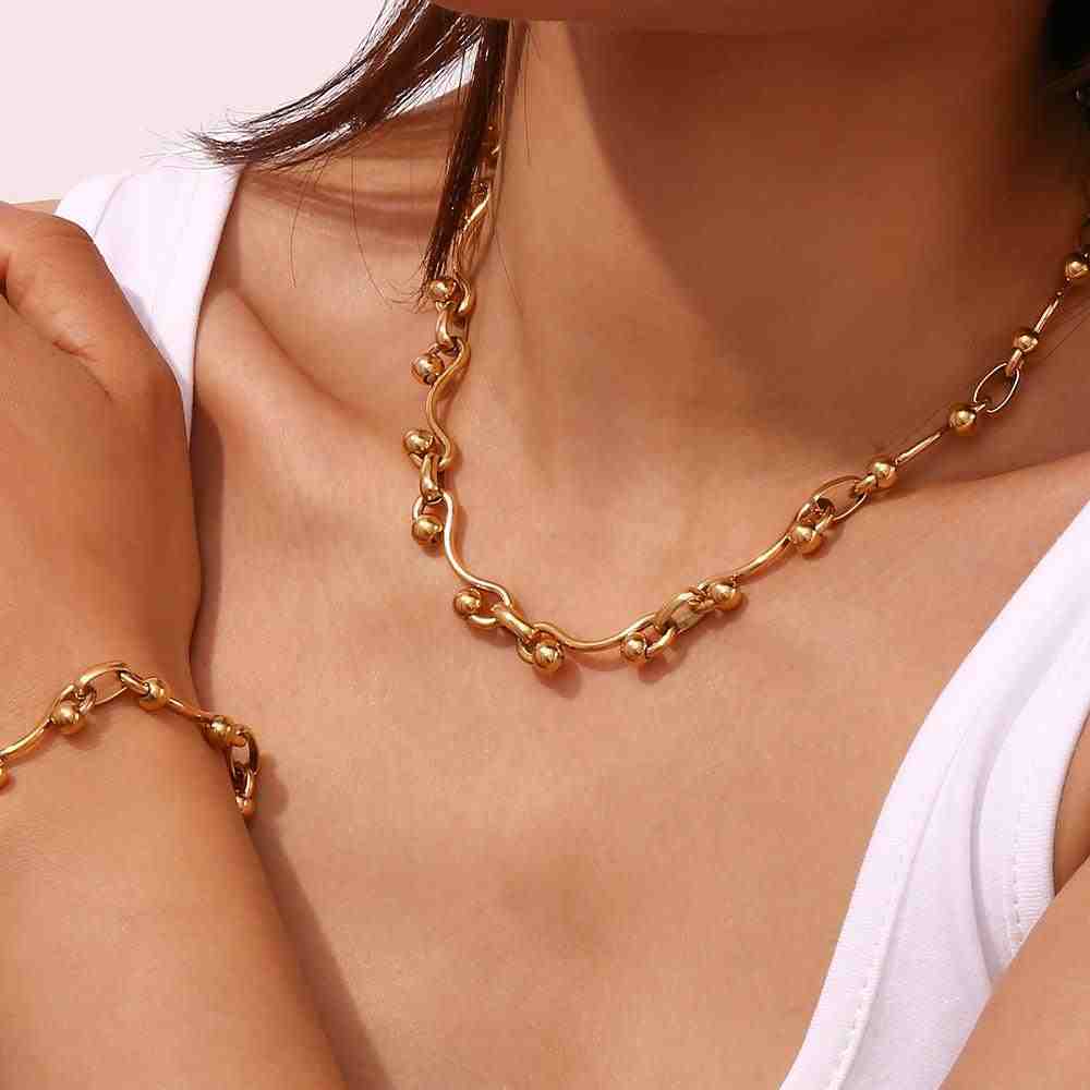 Girl wearing Beautiful Handmade Necklace Aristo - 18k Gold Plated. Shop at Mithra and Co.