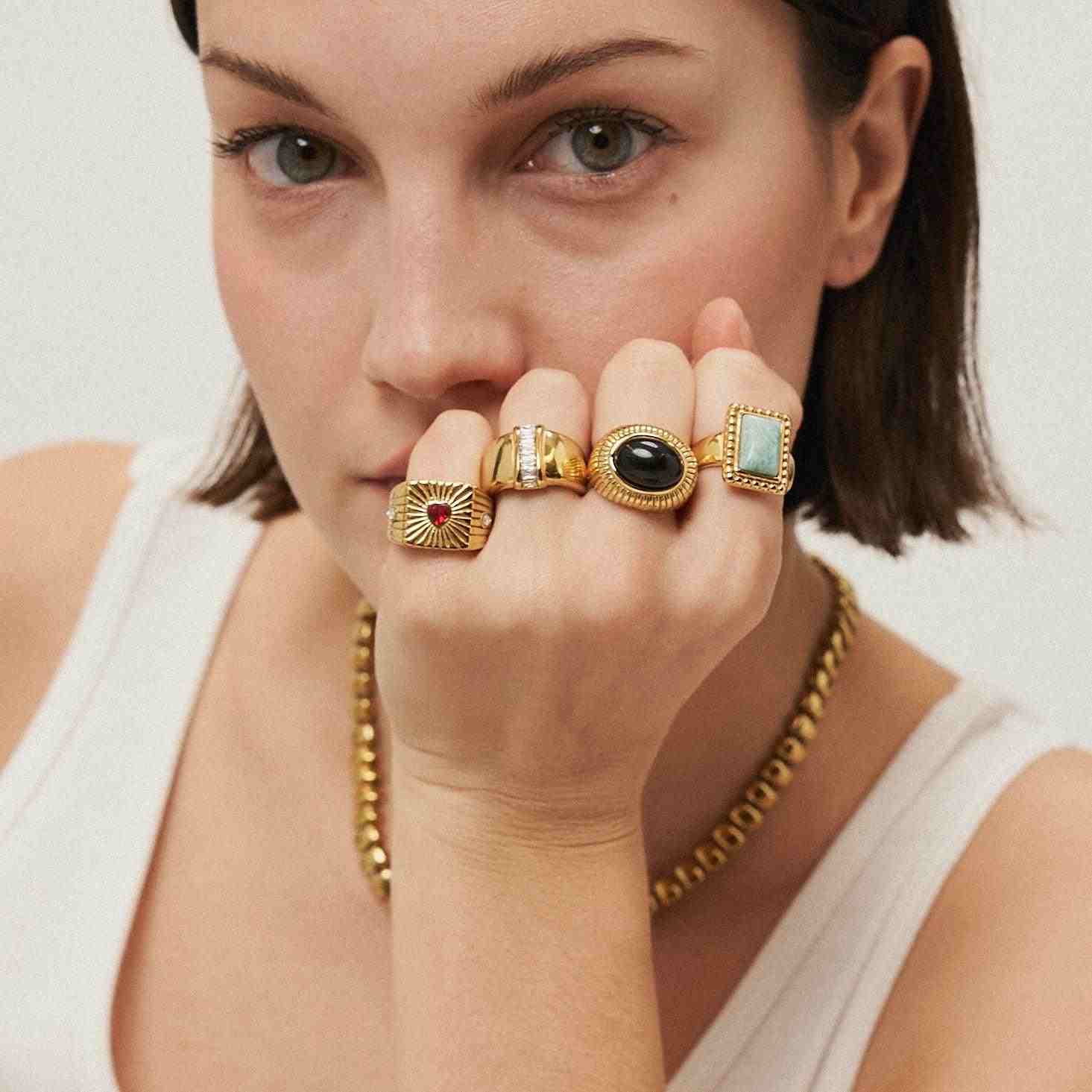 Girl wearing 18k Gold Plated rings. Shop Online.