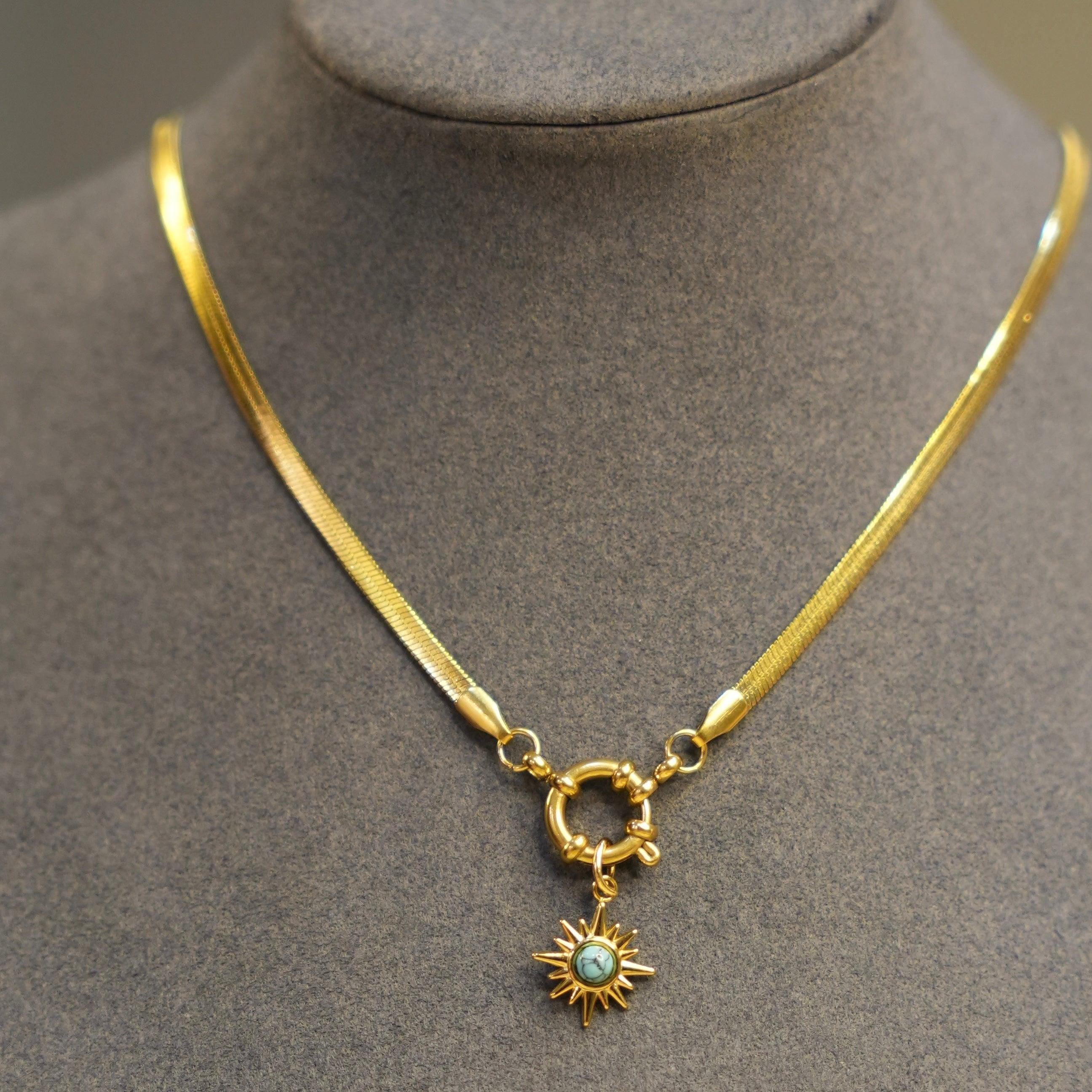 Dummy wearing Gold plated Snake Chain with charm. Buy Online at Mithra and Co.