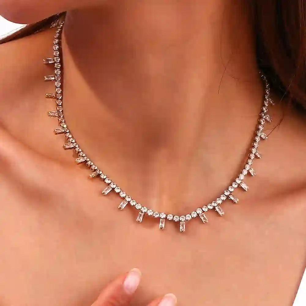 GIrl Wearing 18k Gold Plated Tennis Necklace. Shop at Mithra and Co.