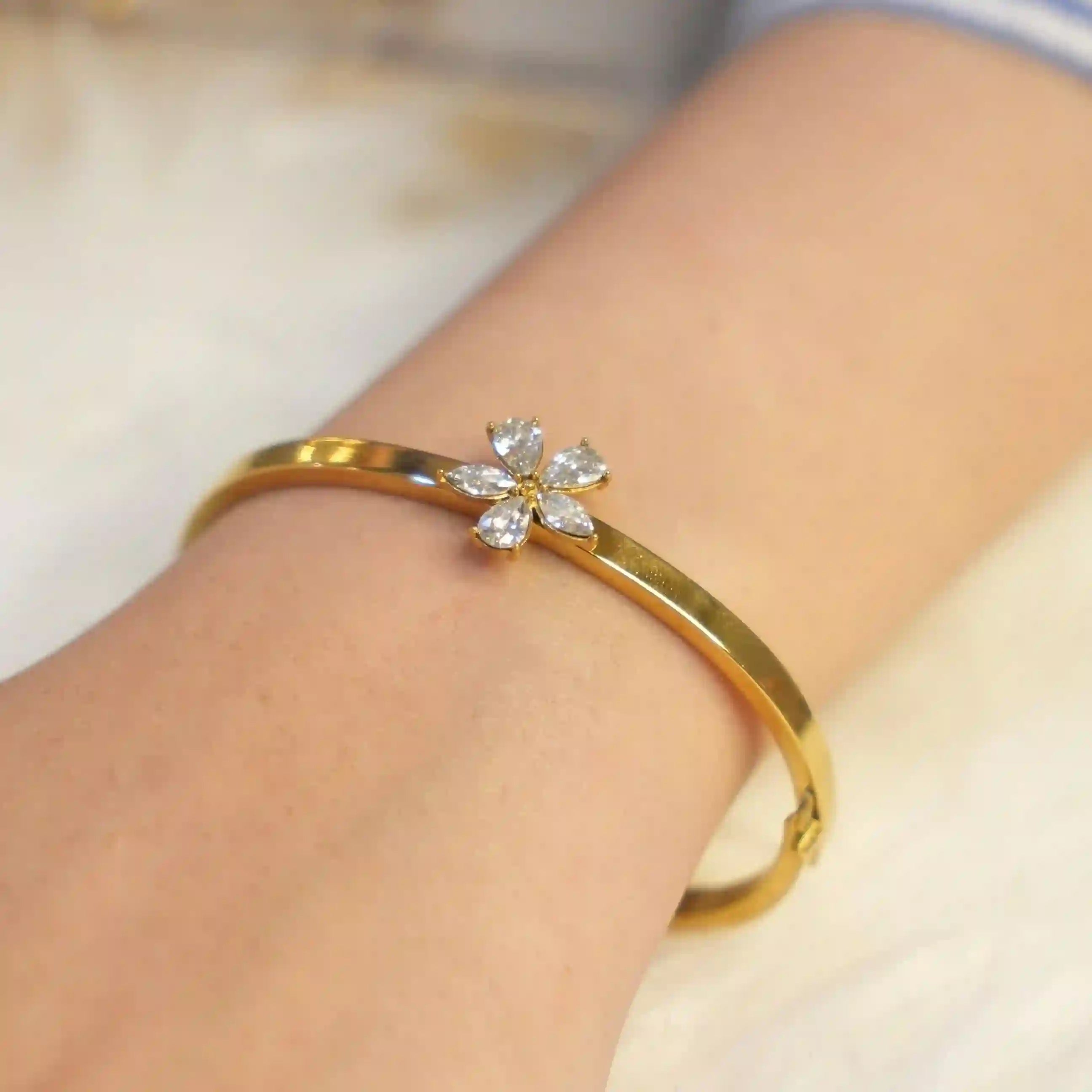 Wearing 18k Gold Plated Flower bangle - Bonsai. Shop Online at Mithra and Co.