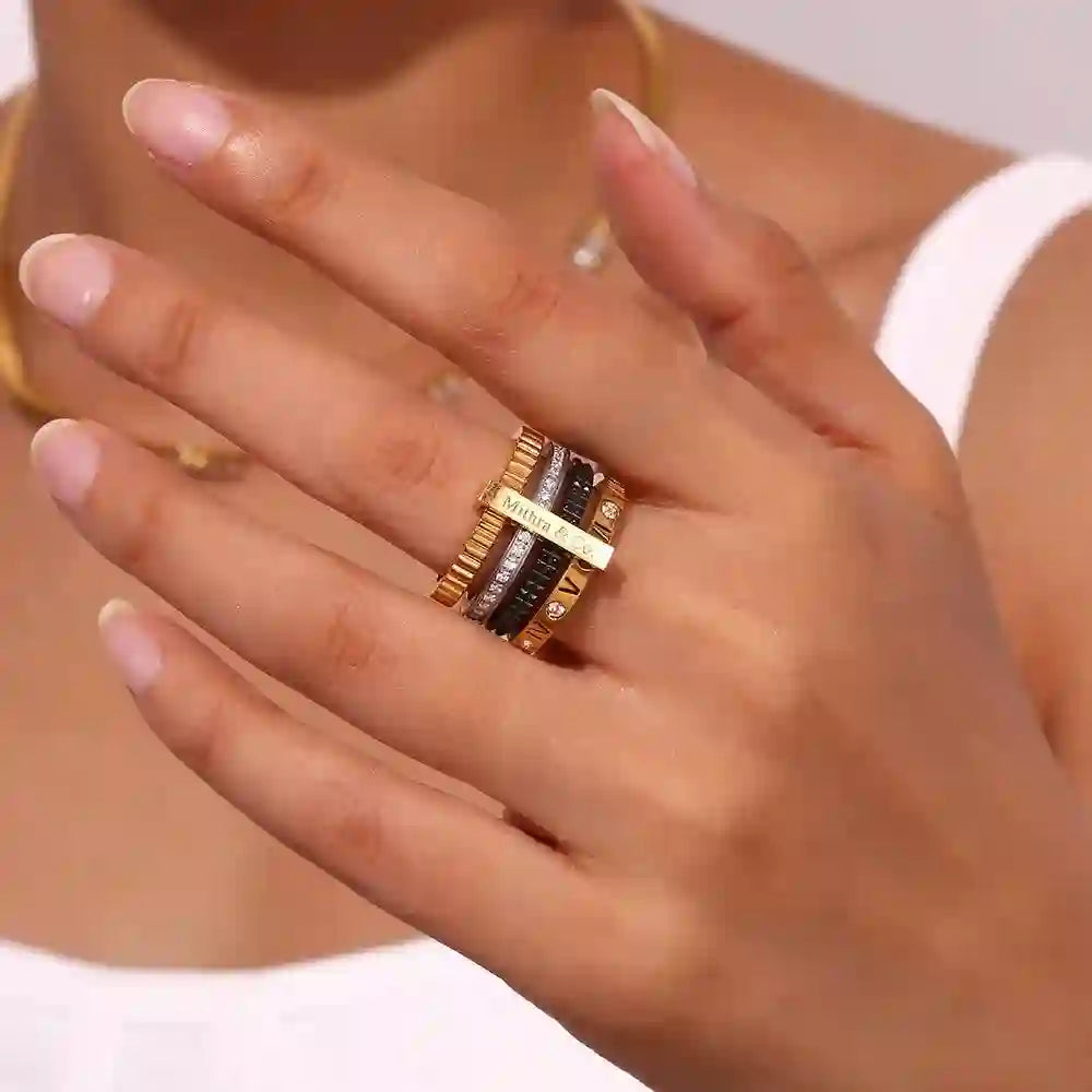Girl wearing 18k gold plated Stack Rings. Shop at Mithra and Co.