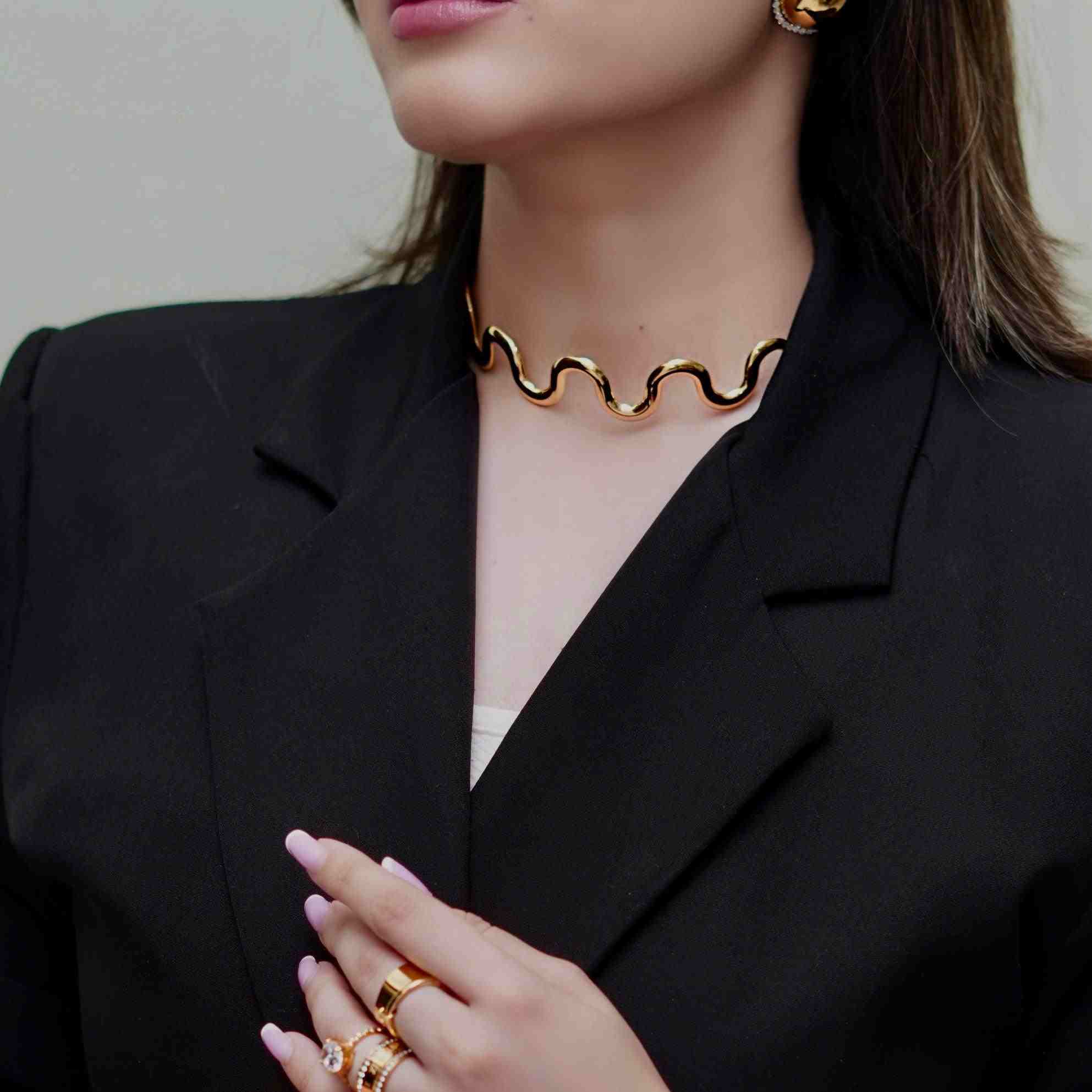 Girl wearing Cascade - Wave Necklace. 18k Gold Plated Mithra and Co.