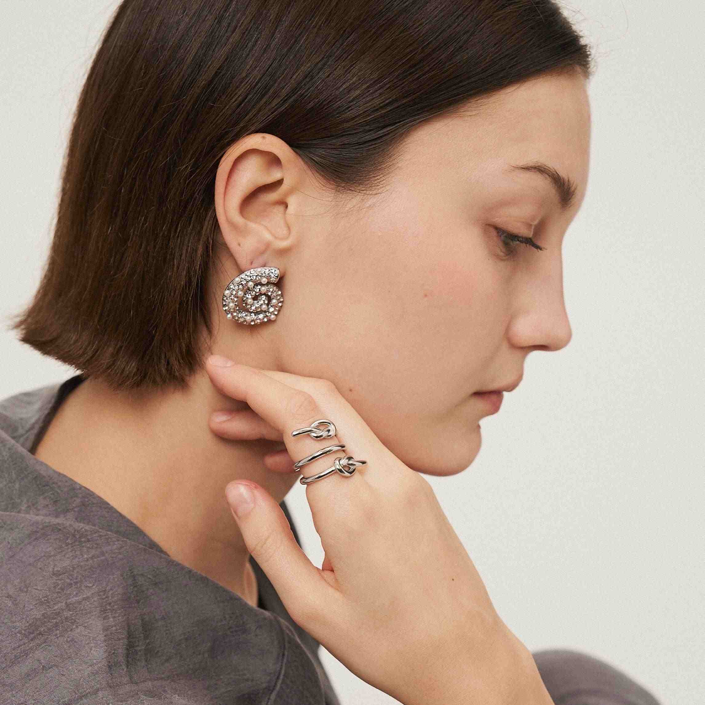Girl Wearing SIlver Plated Earring and Ring. Buy Online.