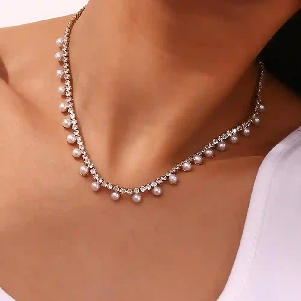 Girl wearing 18k Gold Plated White Pearl Necklace - Regal Emblem. Shop at Mithra and Co.