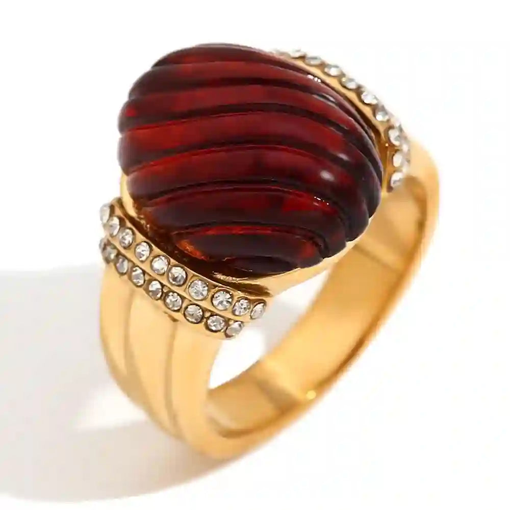 Luminara Ring- 18k gold plated ring with a red amber stone. Shop Now.