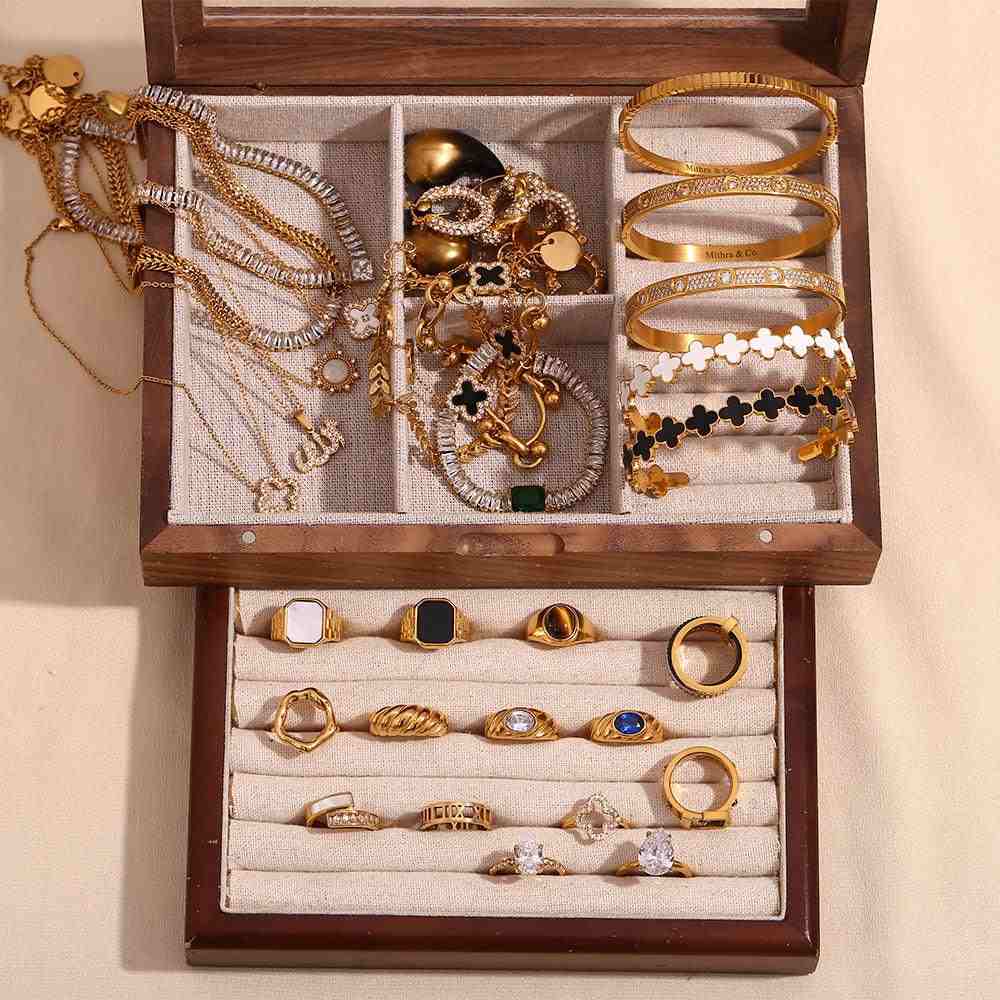 18k Gold Plated bangles and rings. Shop at Mithra and Co.