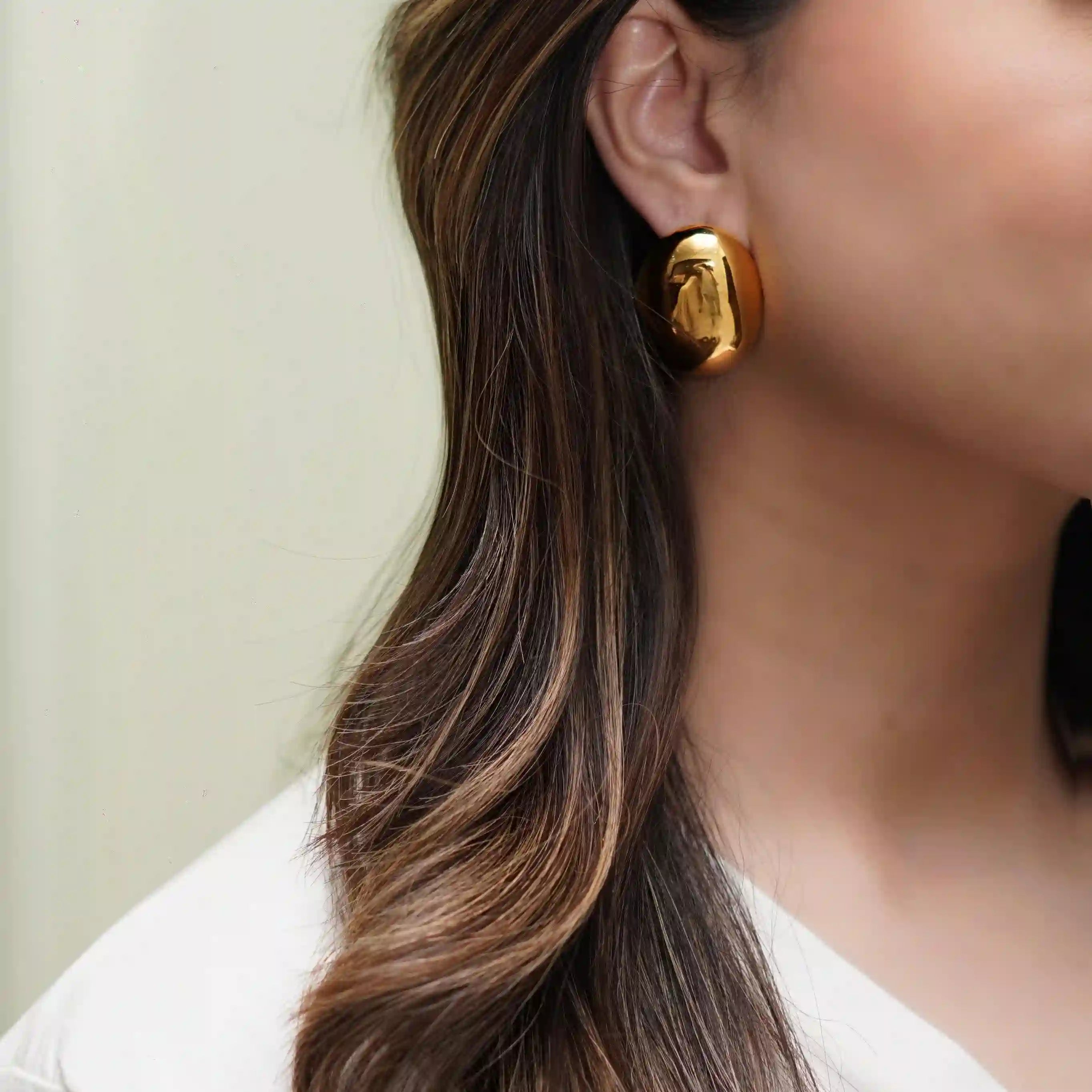 Girl wearing Dome Gold Earrings - Golden Rivulet. Shop Online at Mithra and co.
