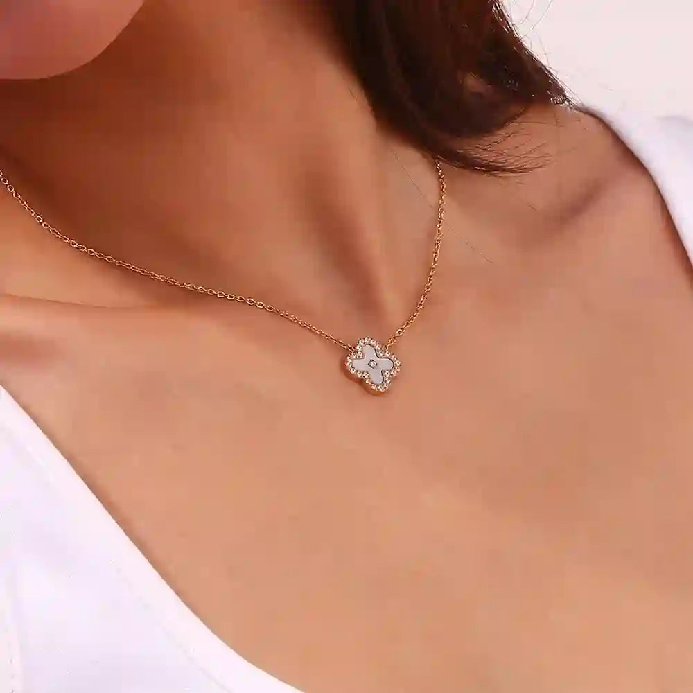 Girl Wearing Opal Clover Necklace 18k Gold Plated. Shop at Mithra and Co.
