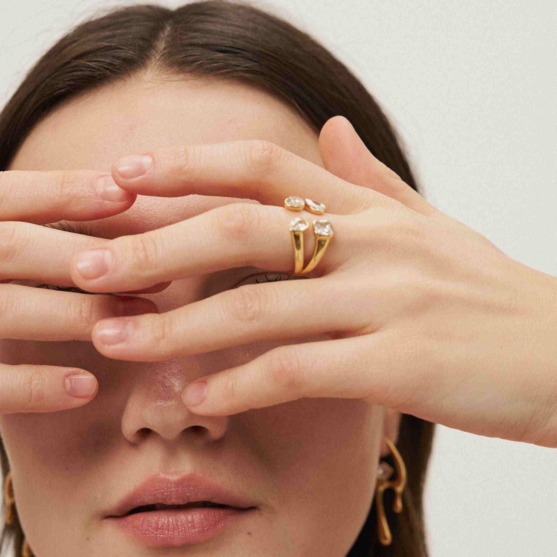 GIrl Wearing Tetra Ring. 18 Gold Plated - 4 Stone Ring - Shop at Mithra and Co.