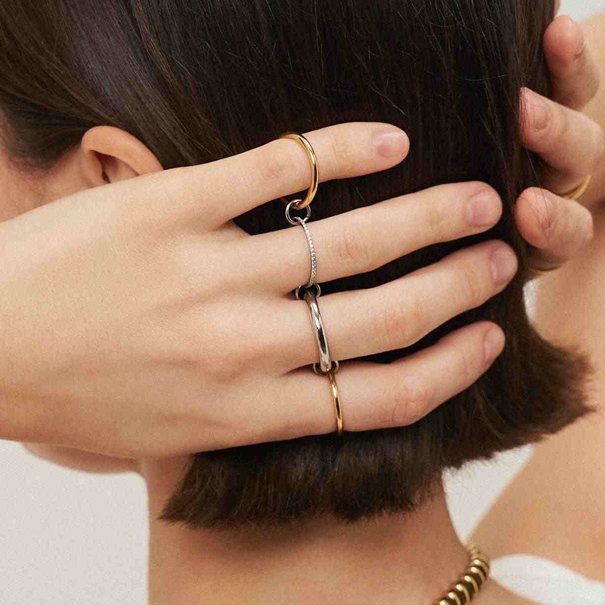Wearing Timeless stack rings. Buy at Mithra and Co.