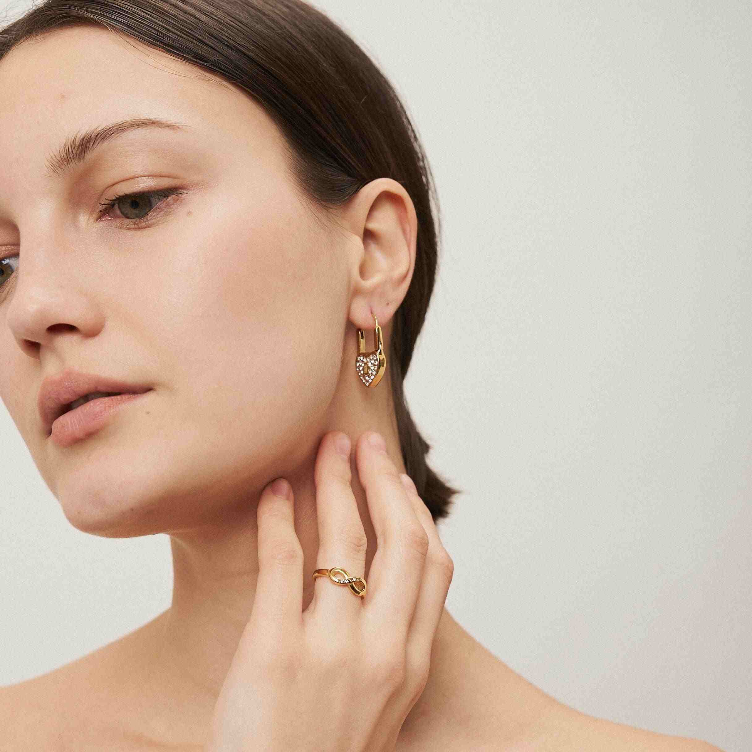 Girl wearing Infinity Ring - Shop 18k Gold Plated Artificial Jewelry Online at Mithra and Co.