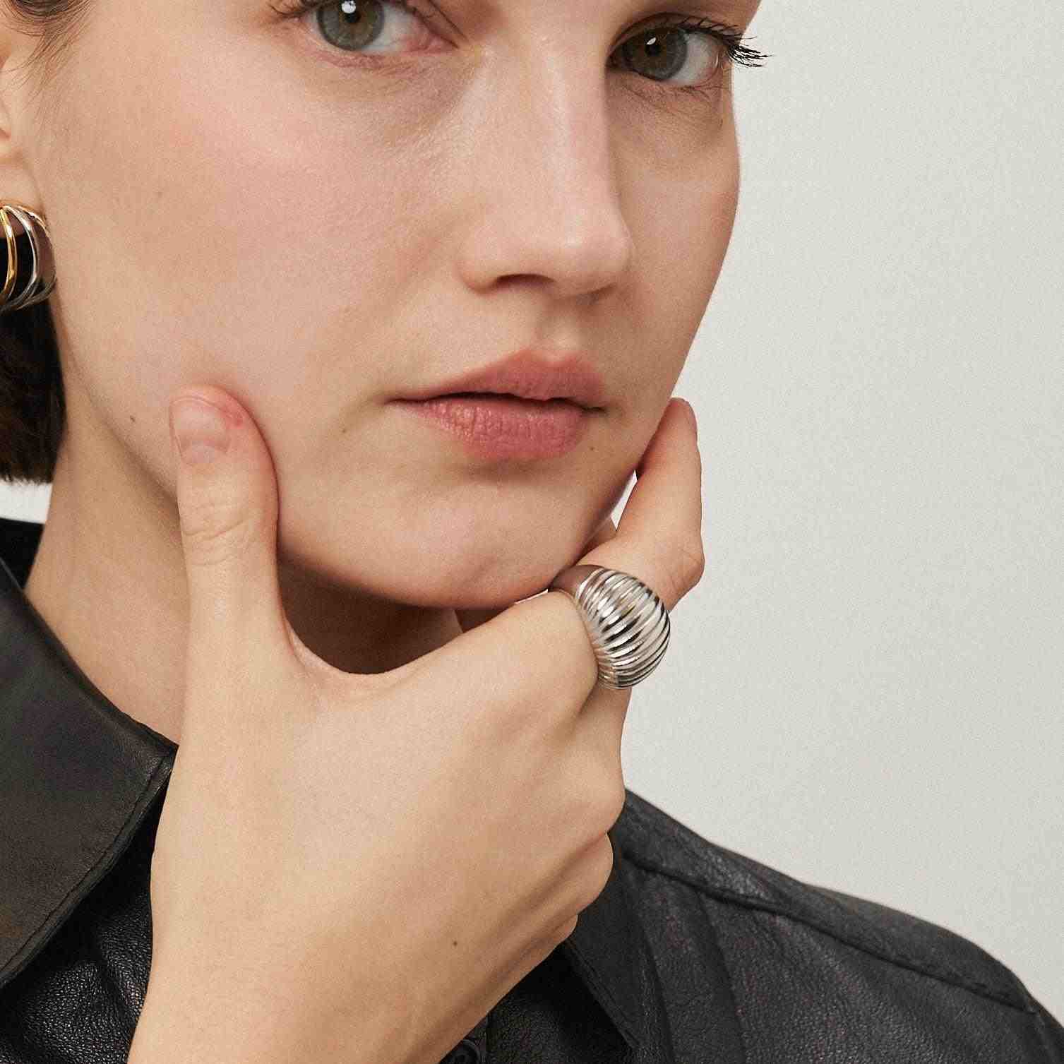 Girl wearing Lumiere ring silver plated . Buy Online.