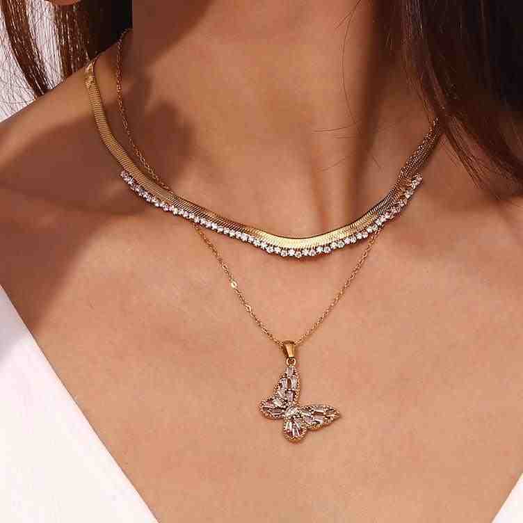 Girl wearing 18k Gold Plated Herringbone Necklace Serenade. Shop at Mithra and Co.