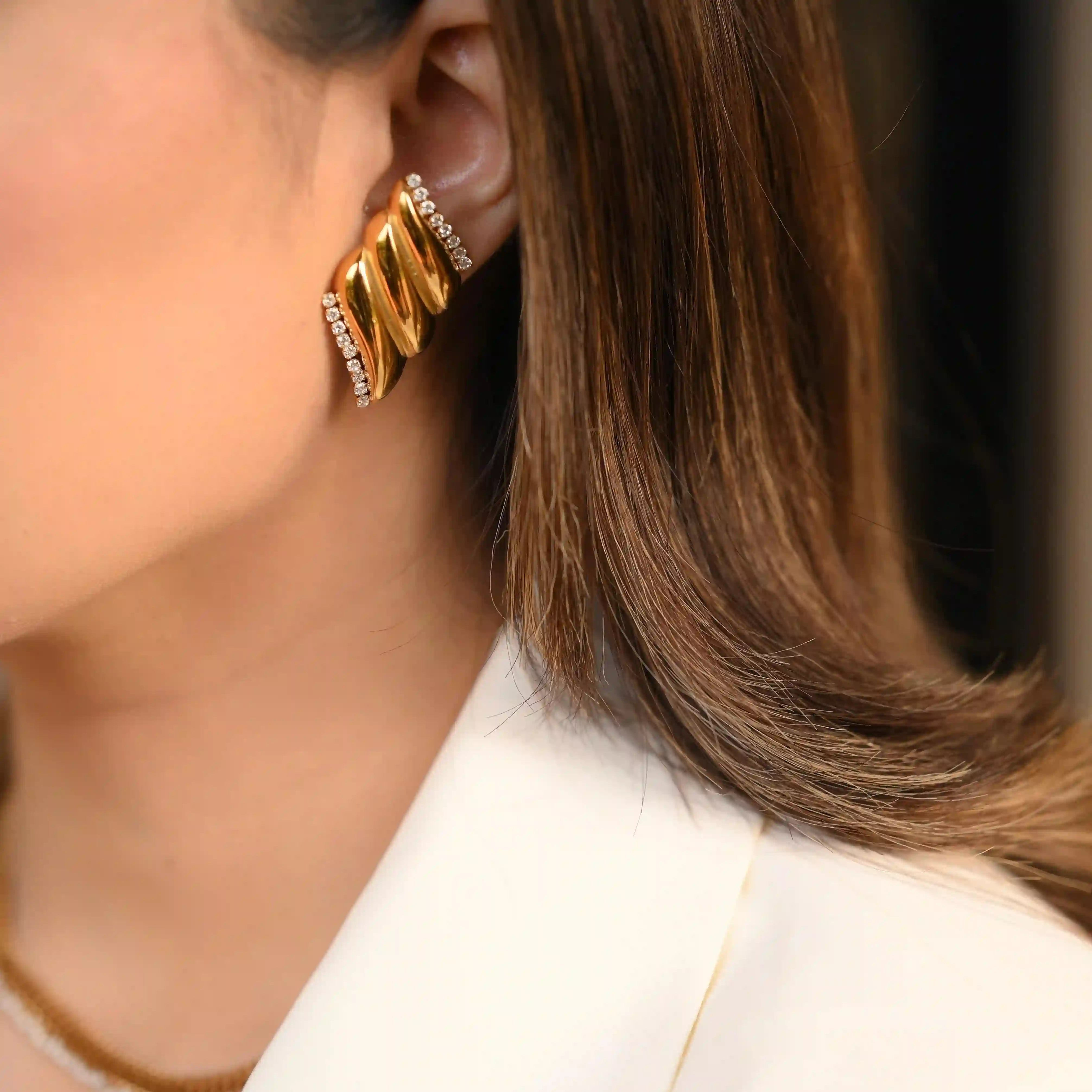 Girl wearing Fire Flame Earrings - Papyrus. Buy Online at Mithra and Co.