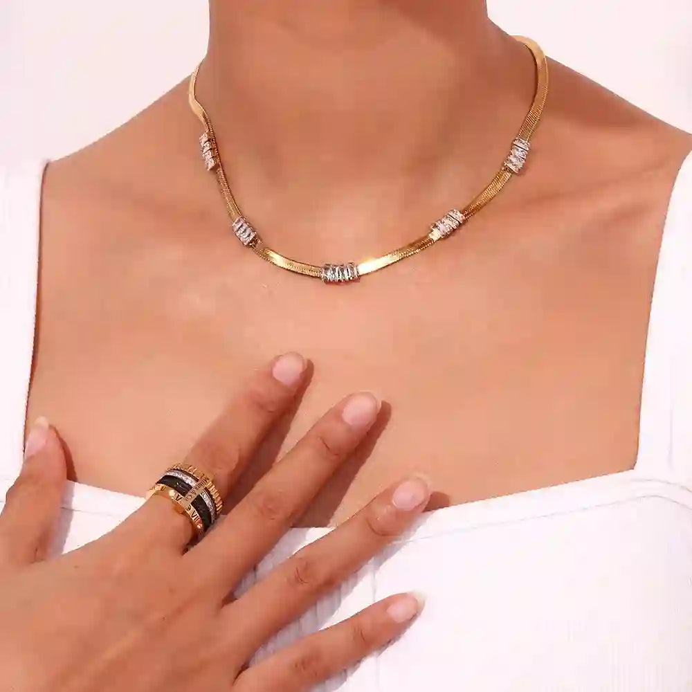 Girl wearing 18k gold plated Stacked Rings. Shop at Mithra and Co.