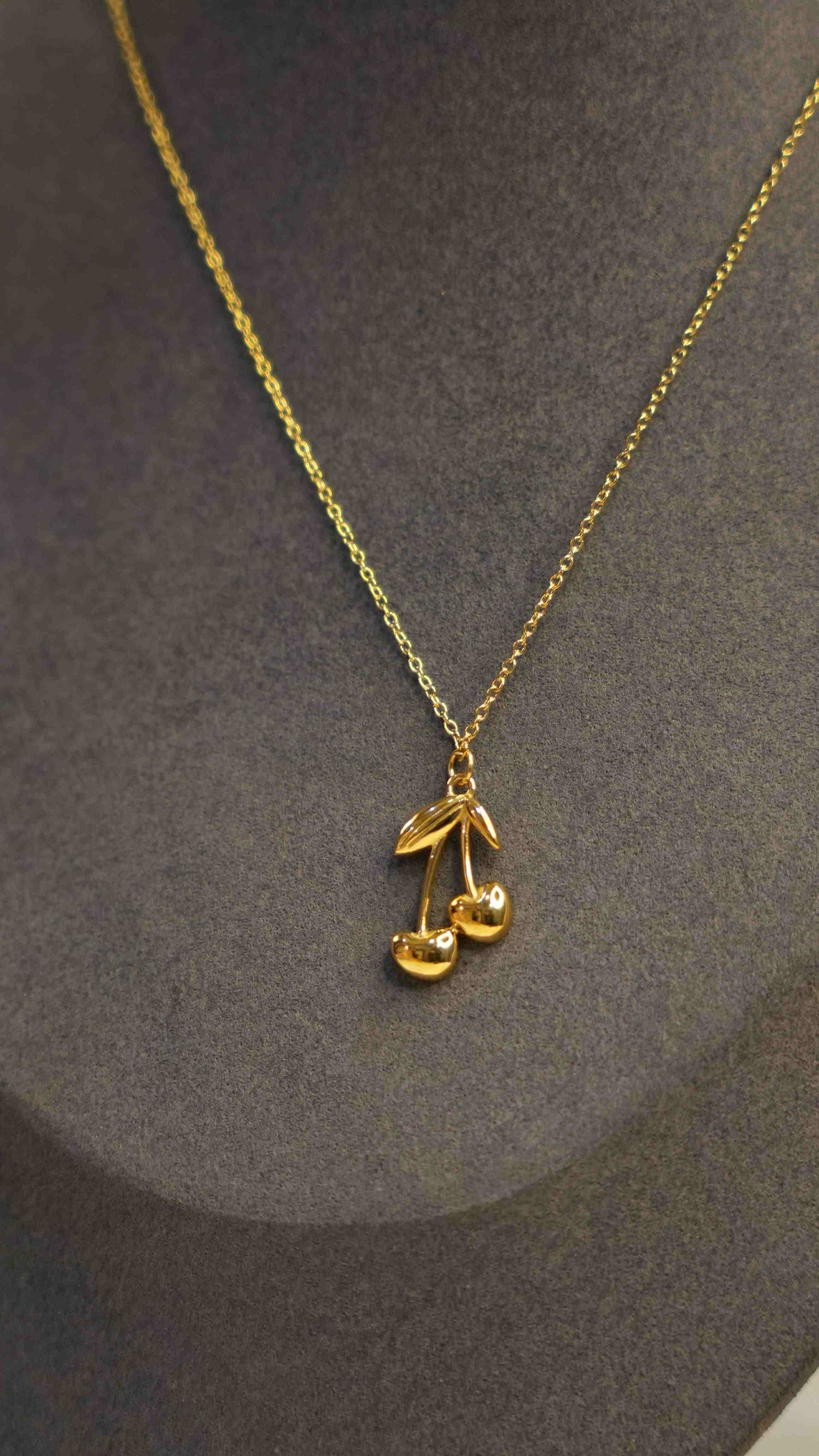 Dummy wearing 18k Gold Plated Cherry Pendant. Buy Online.
