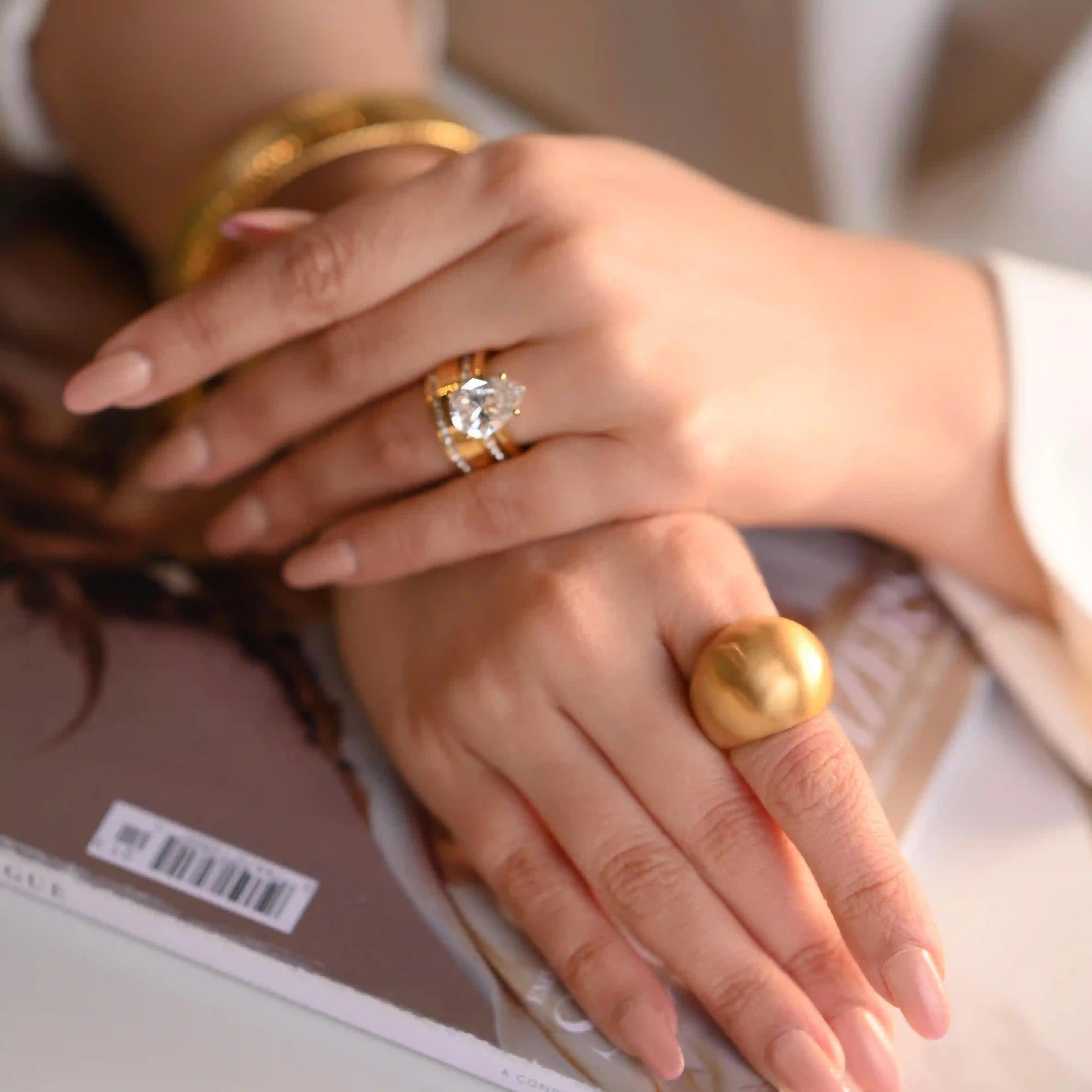 Girl Wearing 18k Gold Plated Ring. Buy now at Mithra and Co.