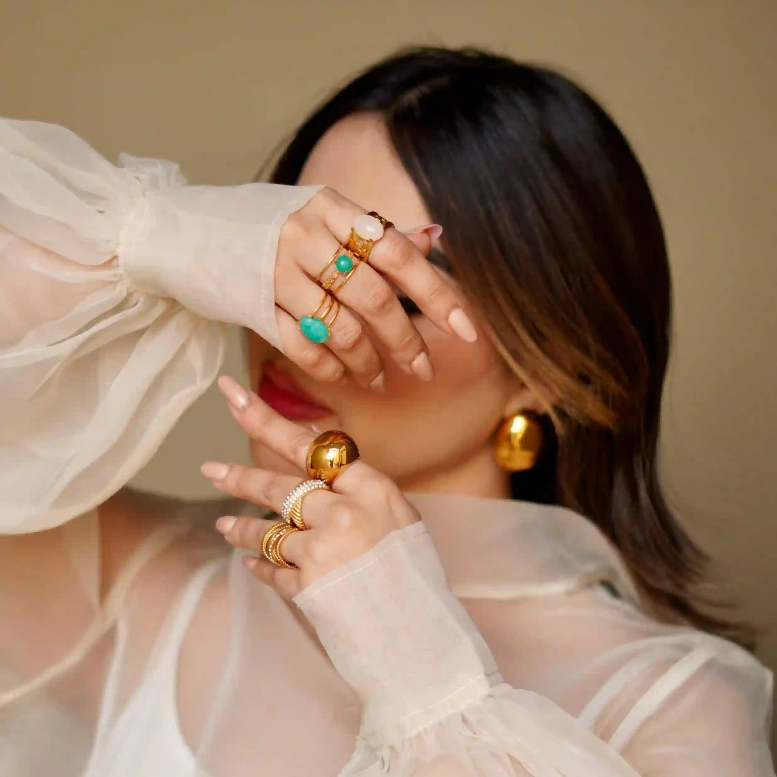 Girl wearing Dome Gold Earrings - Golden Rivulet. Shop Online at Mithra and Co.