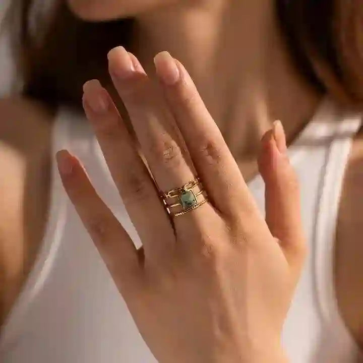 Girl wearing Amulet RIng. Buy 18k Gold Plated at Mithra and Co.