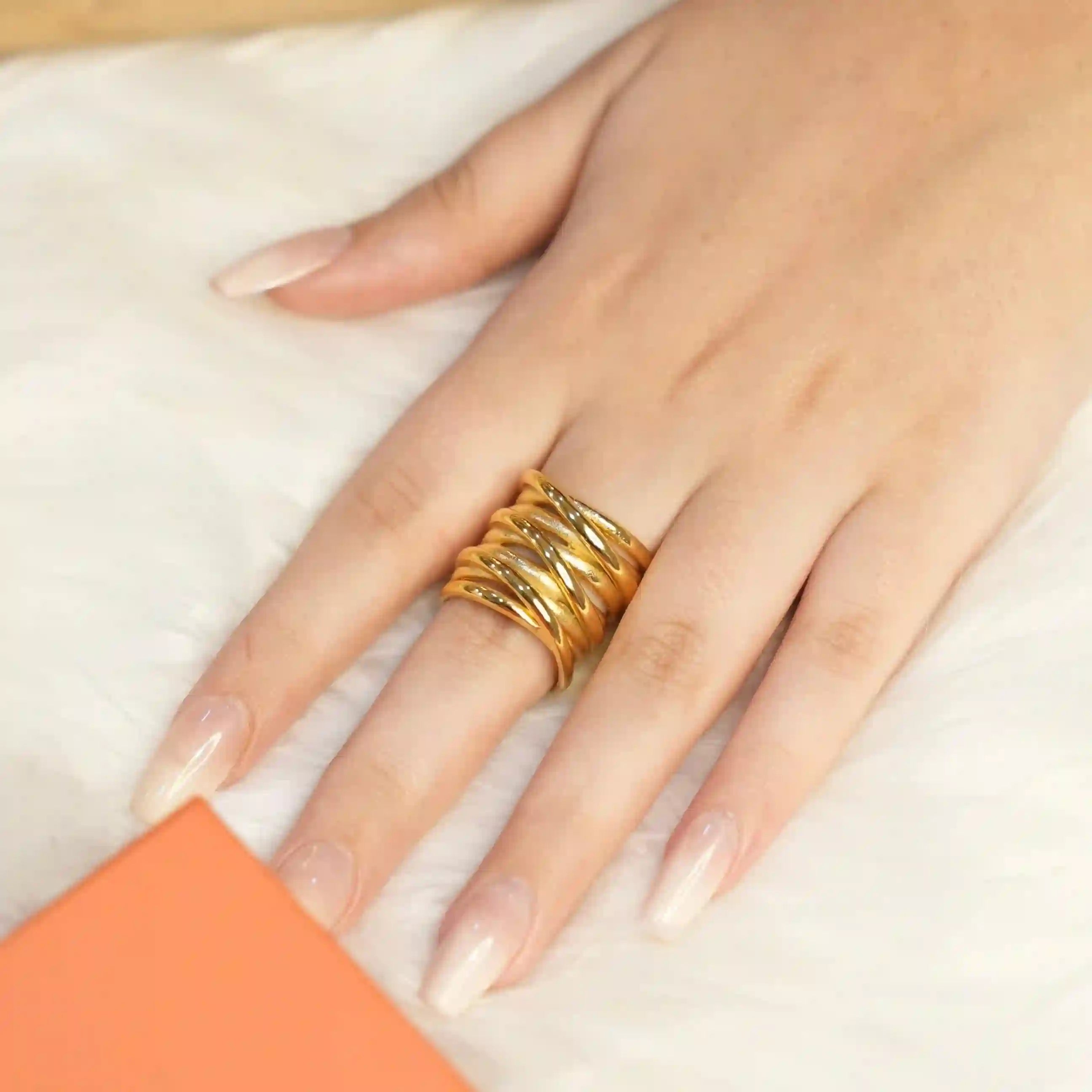 Wearing 18k Gold Plated Solara Ring. Shop Crossover Ring Online.