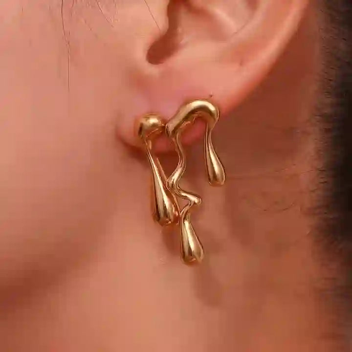 Wearing Waterdrop Earrings - Shop 18k gold plated Liquid earrings at Mithra and Co.