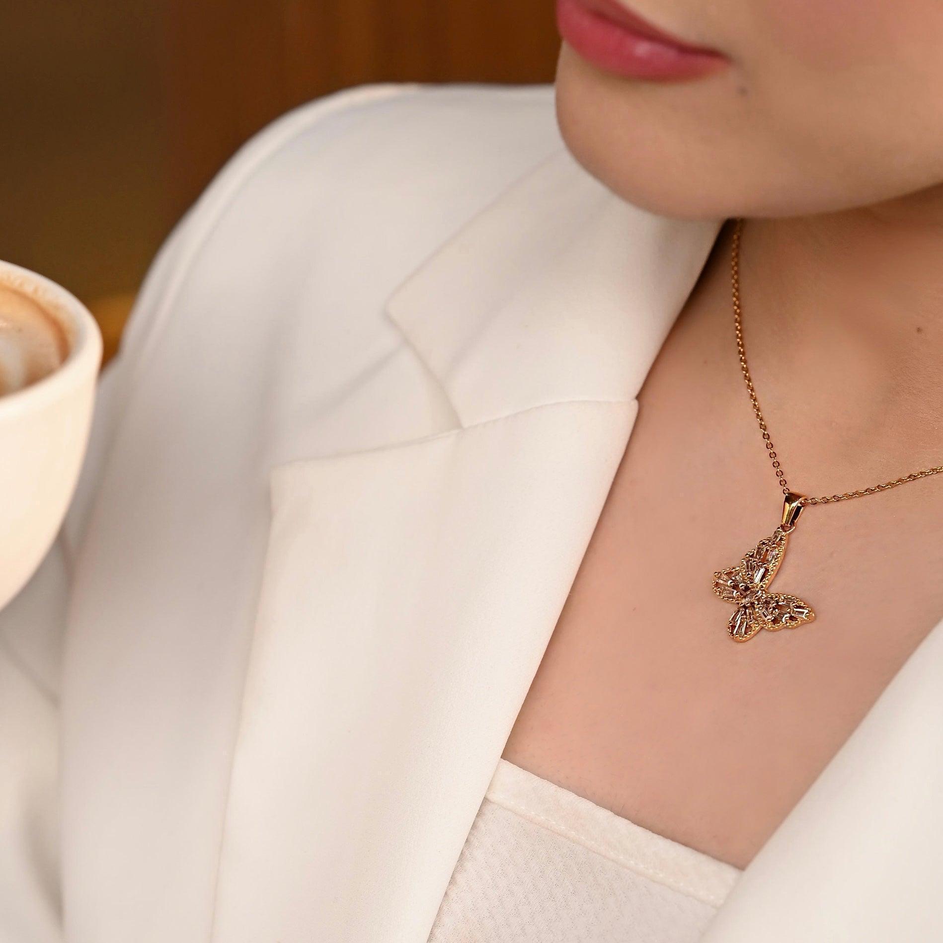 Girl wearing Enchanted Flutter, 18k gold plated Butterfly necklace, Buy Online at Mithra and Co.