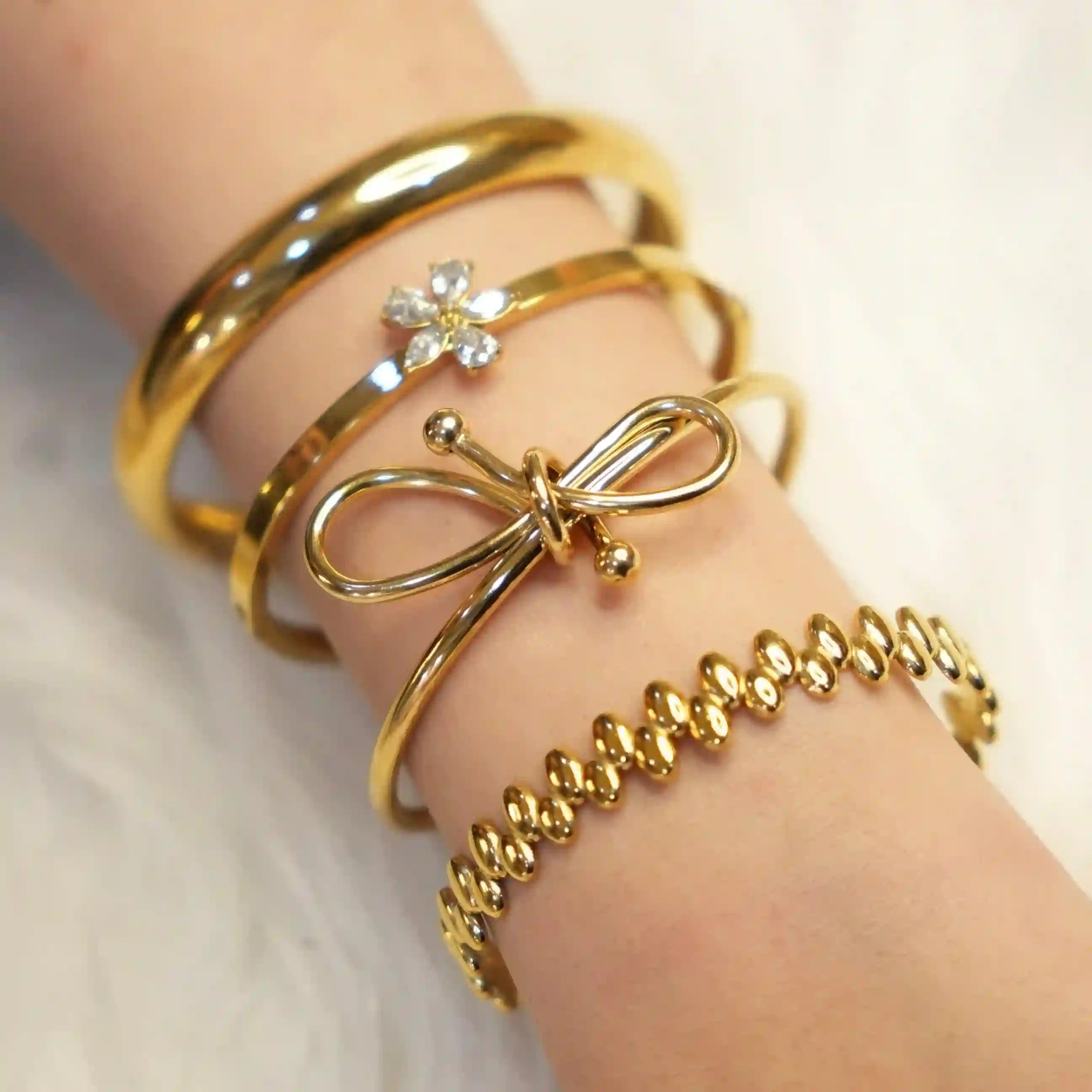 Girl wearing Cuff Bracelets: Buy Now.