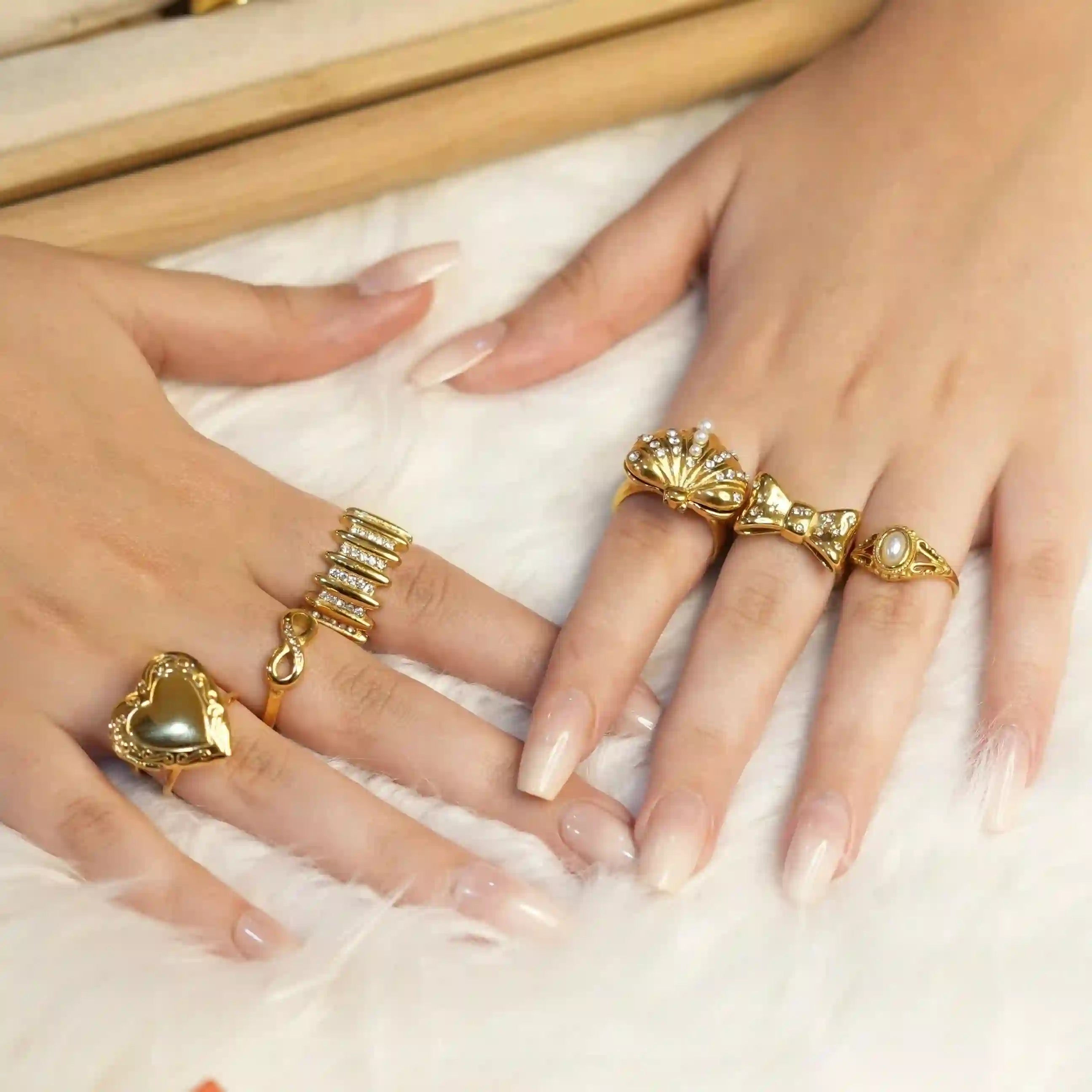 Wearing 18ik Gold plated Charm Rings. Buy Online at Mithra and Co.