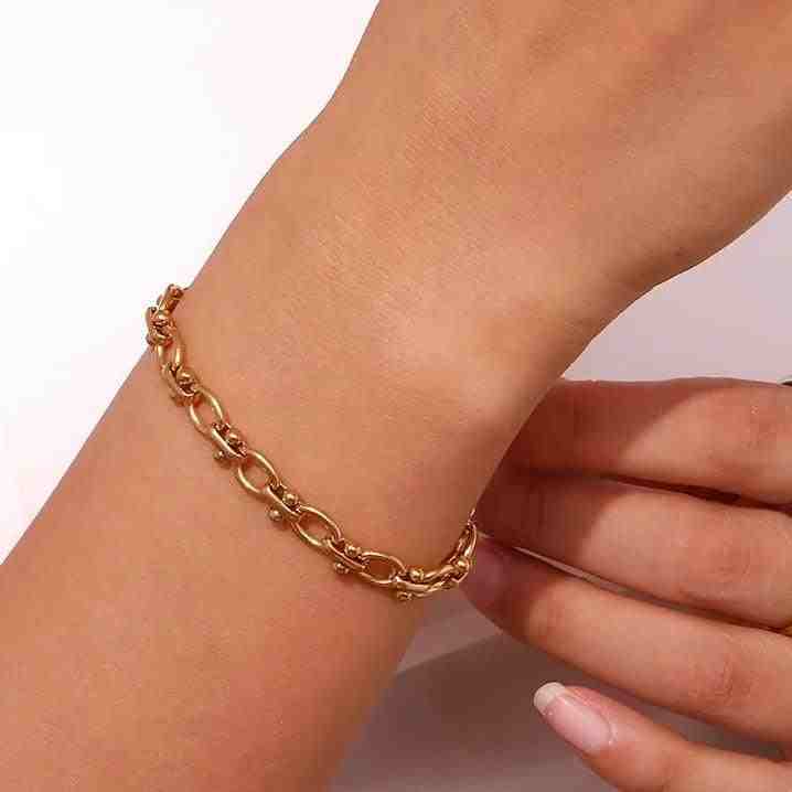 Wearing Delulu on wrist. Buy 18k Gold Plated Chain Bracelet Online at Mithra and Co.