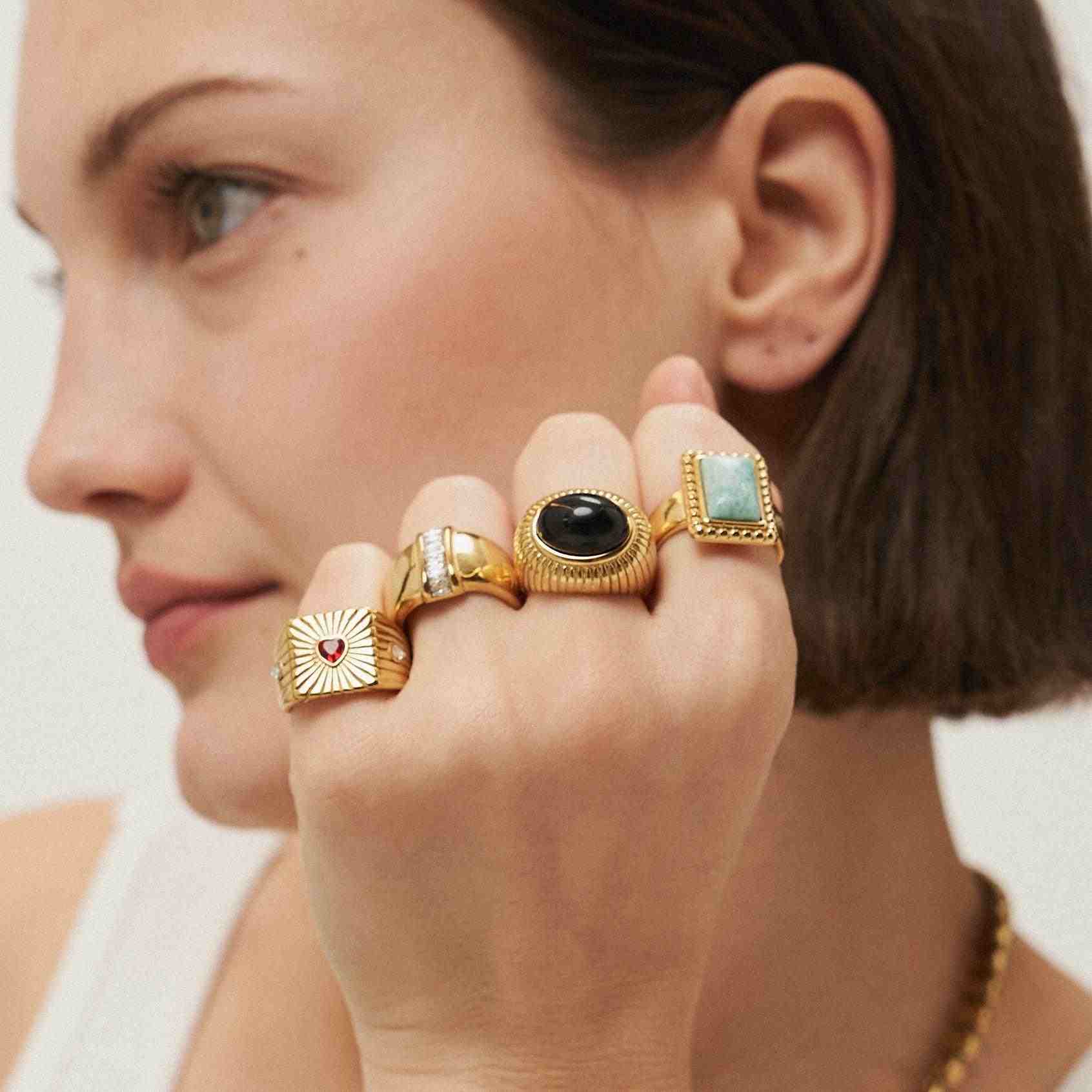 Girl wearing 18k Gold Plated rings Buy Online at Mithra and Co.