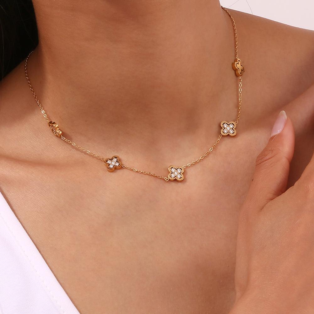 Girl wearing 18k Gold Plated Clover Necklace. Buy at Mithra and Co.
