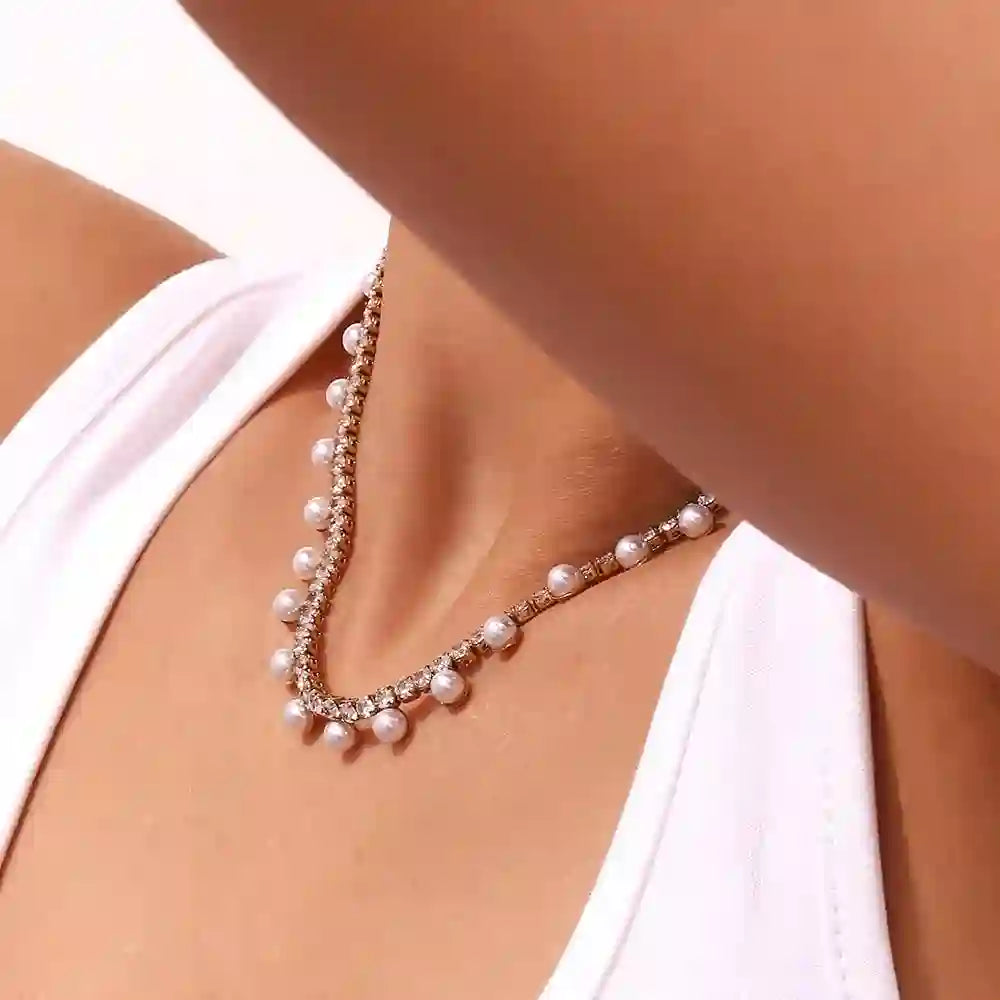 Girl wearing Regal Emblem - 18k Gold Plated White Pearl Necklace. Shop Now.