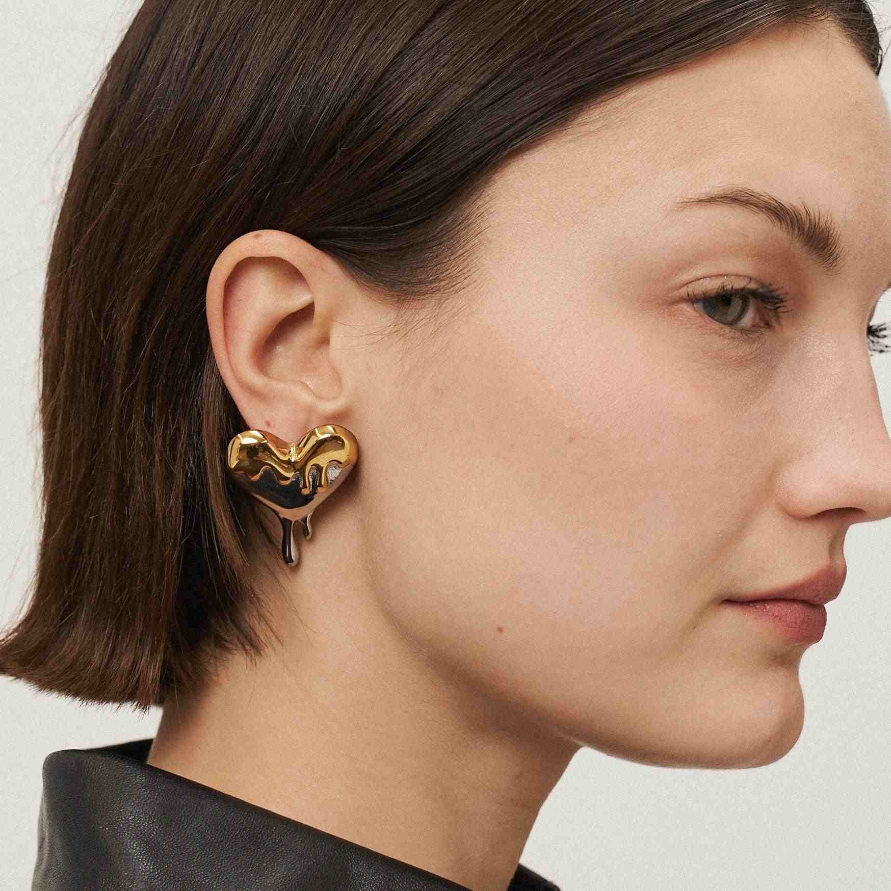 Girl Wearing Gold Plated Heart Stud Earrings. Shop Online at Mithra and Co.