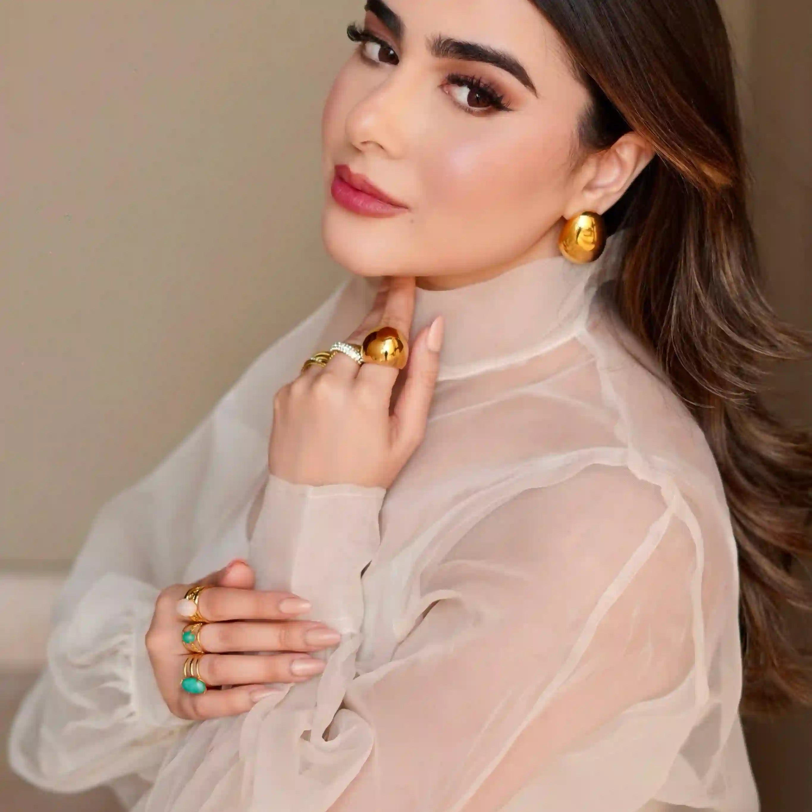 Girl wearing 18k Gold Plated Artificial Jewelry. Shop Online at Mithra and Co.