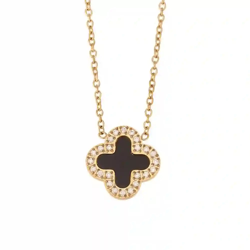 Midnight Clover Necklace 18k Gold plated with Zircons around and black stone in center. Shop Now.