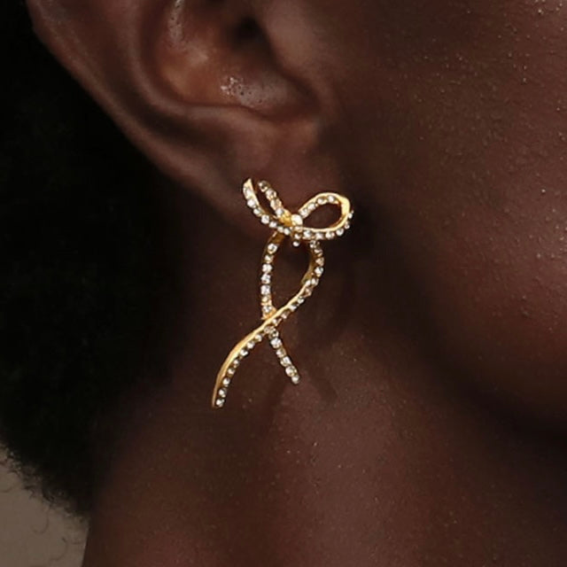Girl Wearing Sculpted Elegance Earrings. Buy at Mithra and Co.