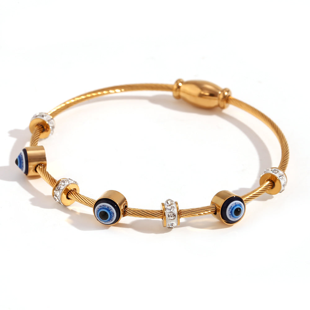 Shop Divya Online - An Evil Eye Bangle. 18k Gold Plated at Mithra and Co