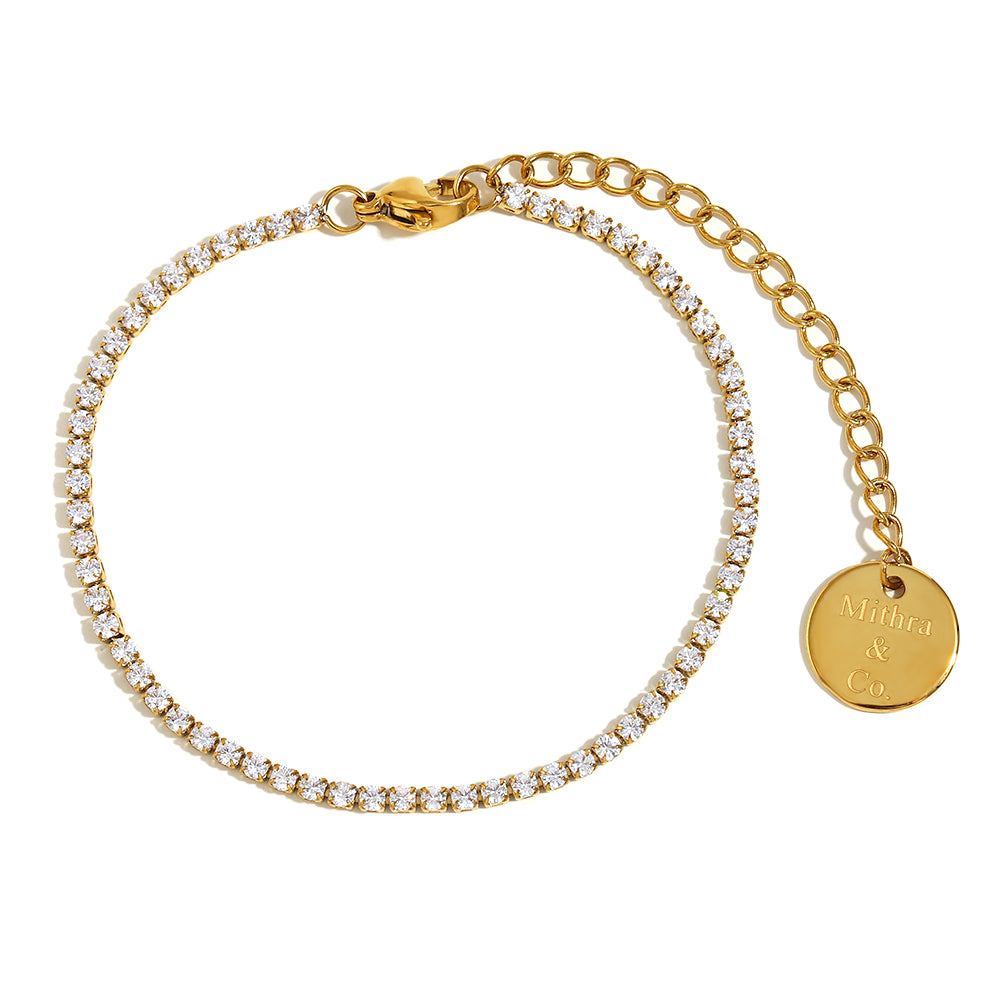 Shop Viscos at Mithra and Co. A Tennis Bracelet features 18k gold plated zircon-studded beads.